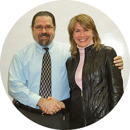 a woman and man doing agreement shaking hands